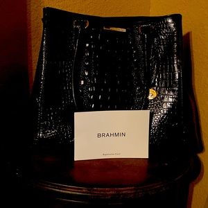 Brand new Large black alligator handbag. Never used